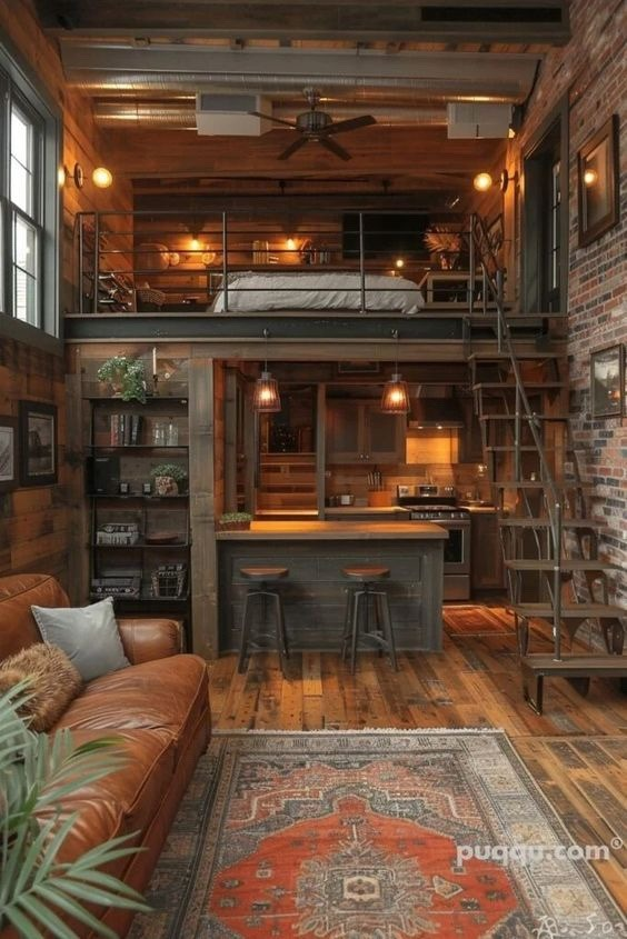 A cozy rustic loft features a kitchen and living area with an upper-level bedroom accessed by a ladder, warm wood tones, and eclectic decor.